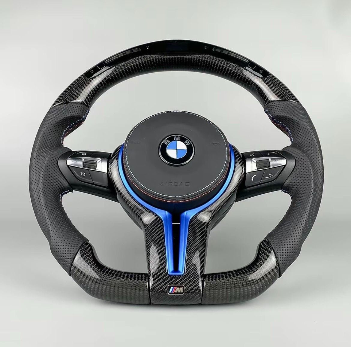Volante BMW carbono LED